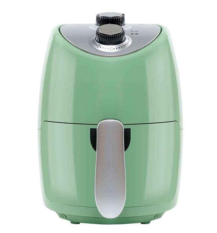 Air Fryer Guide For Beginners - Green air fryer on white background