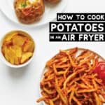 A platter of air fryer sweet potato fries sit next to a bowl of potato chips and a plate of baked potatoes.