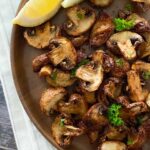 Air Fryer Mushrooms on a brown platter.