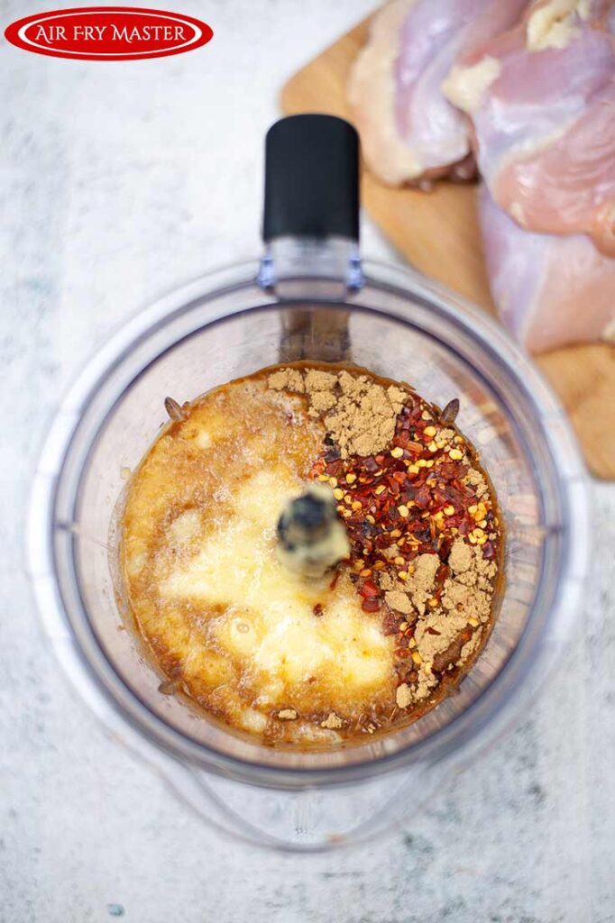 All the Air Fryer Huli Huli Chicken sauce ingredients sitting in a blender cup.