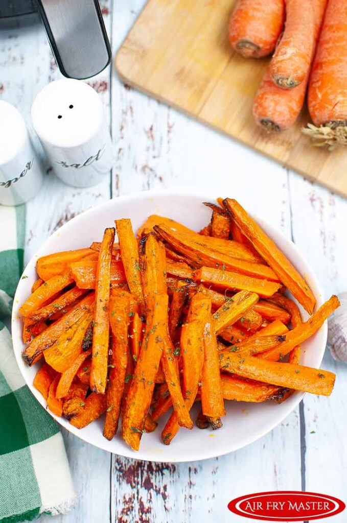 A white bowl filled with Air Fryer Carrot Fries