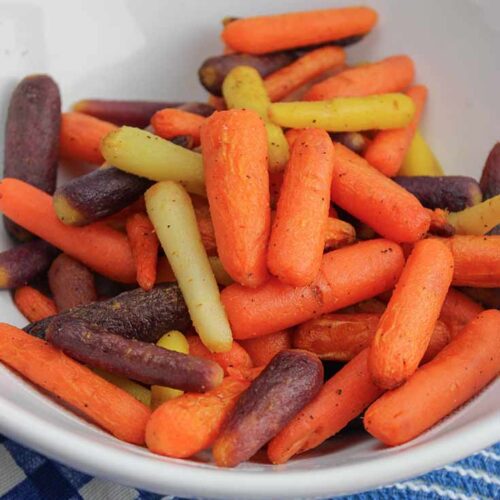 A white bowl filled with these Air Fryer Glazed Carrots Recipe